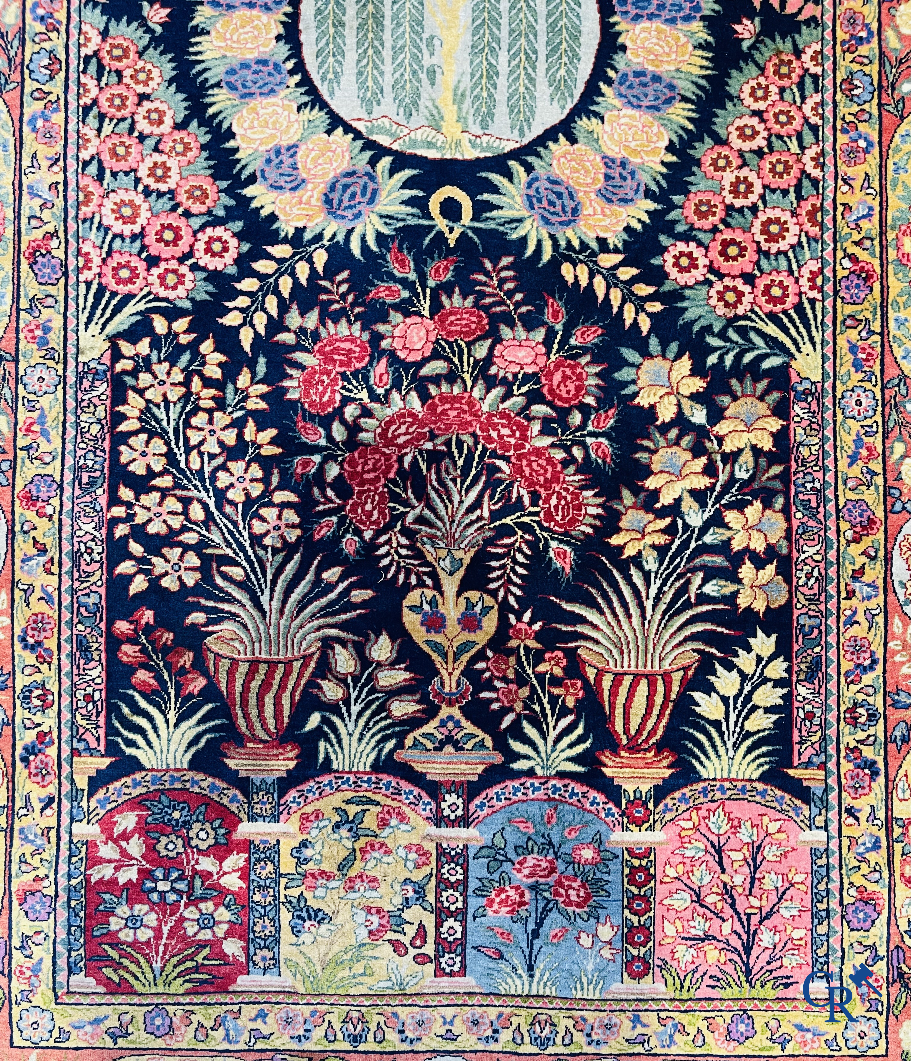 Oriental carpets: A finely knotted Oriental carpet with floral decor. Signed.