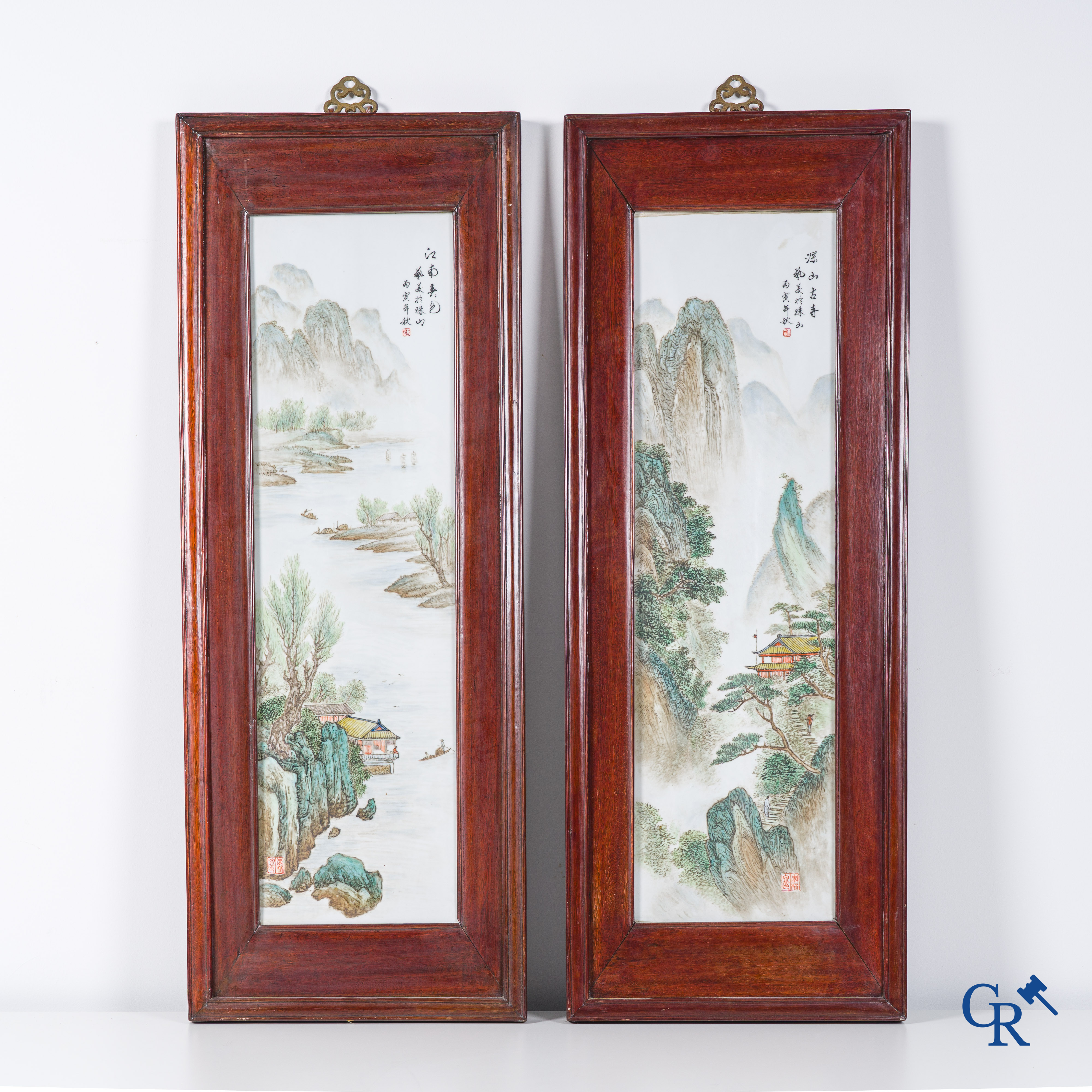 Asian Art: Chinese porcelain, 2 Chinese porcelain plaques with a decor of characters in mountain landscapes. Marked.