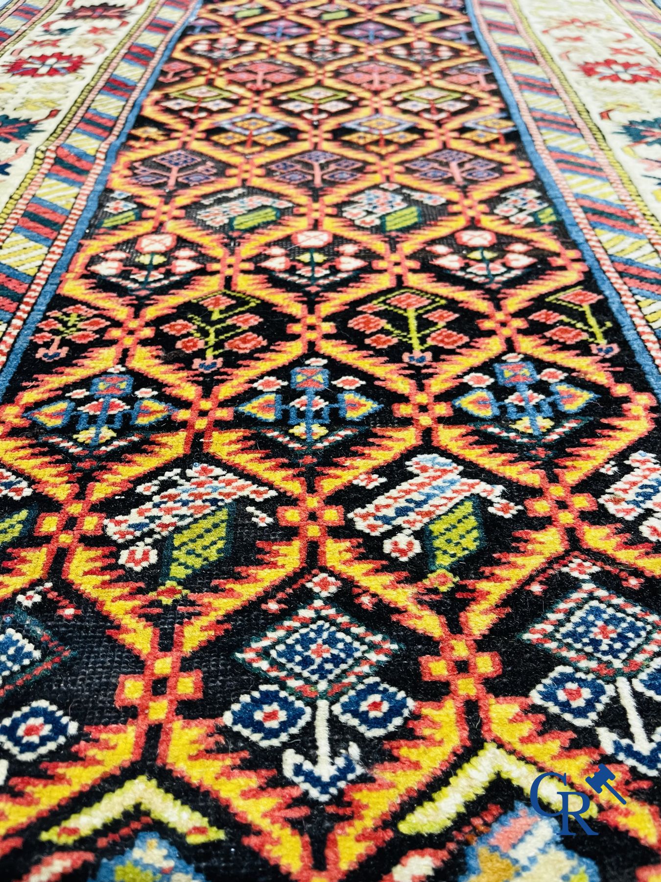 Tapis: Un ancien tapis oriental.