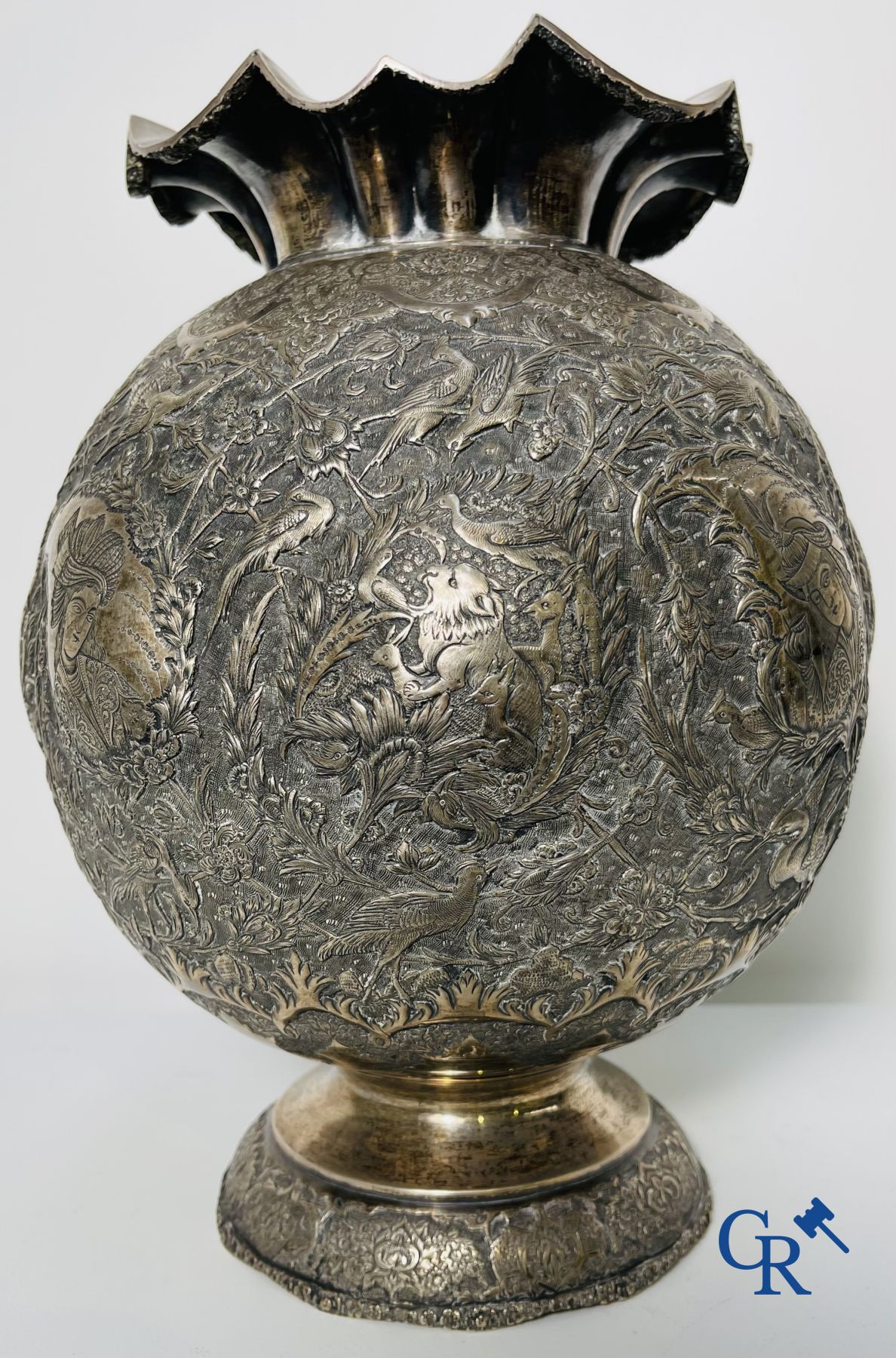 Silver: Vase in silver (Iran?) with a fine decor of birds, forest animals and characters.