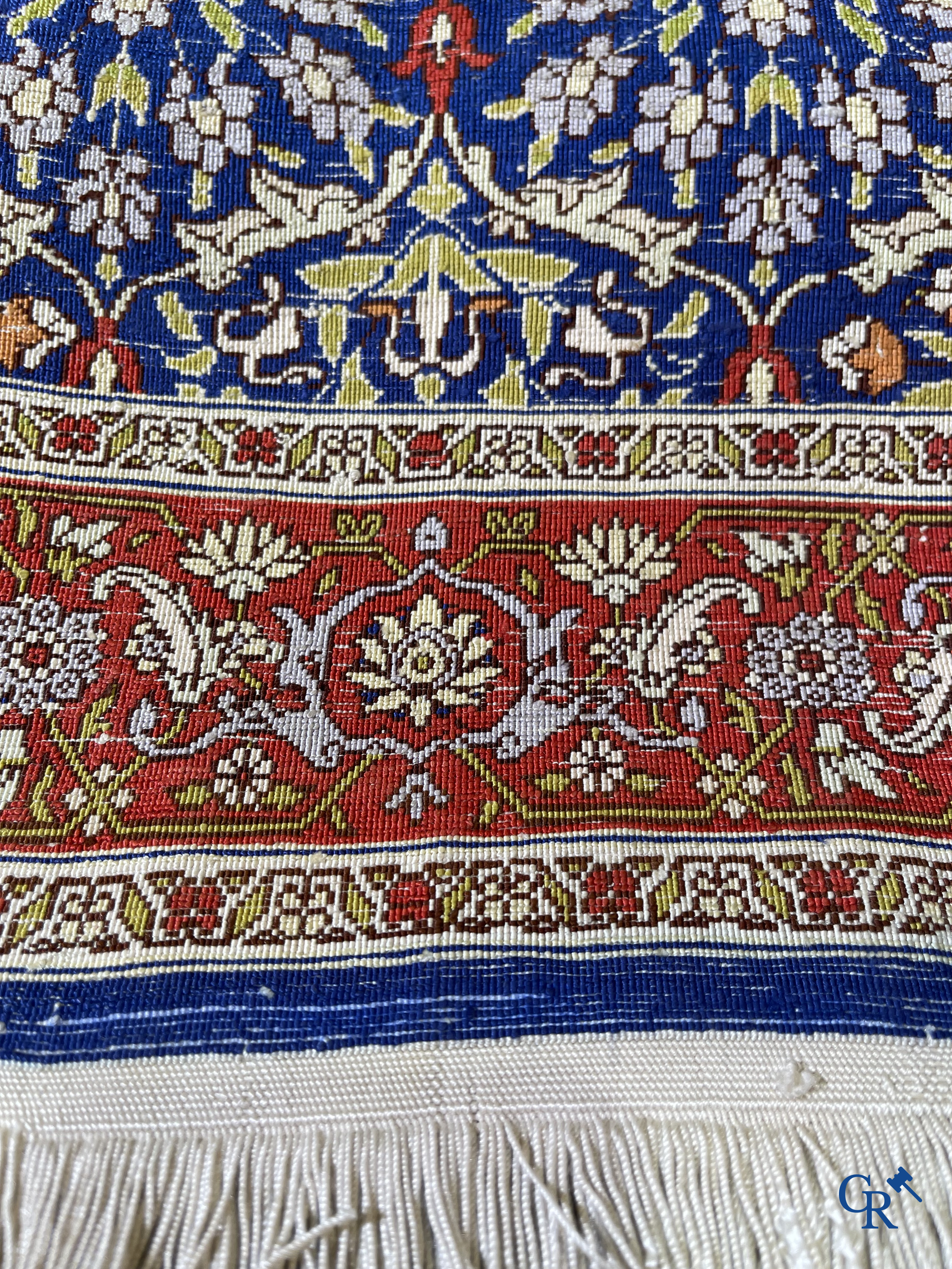 Oriental carpets, a finely hand-knotted silk carpet with floral decor.