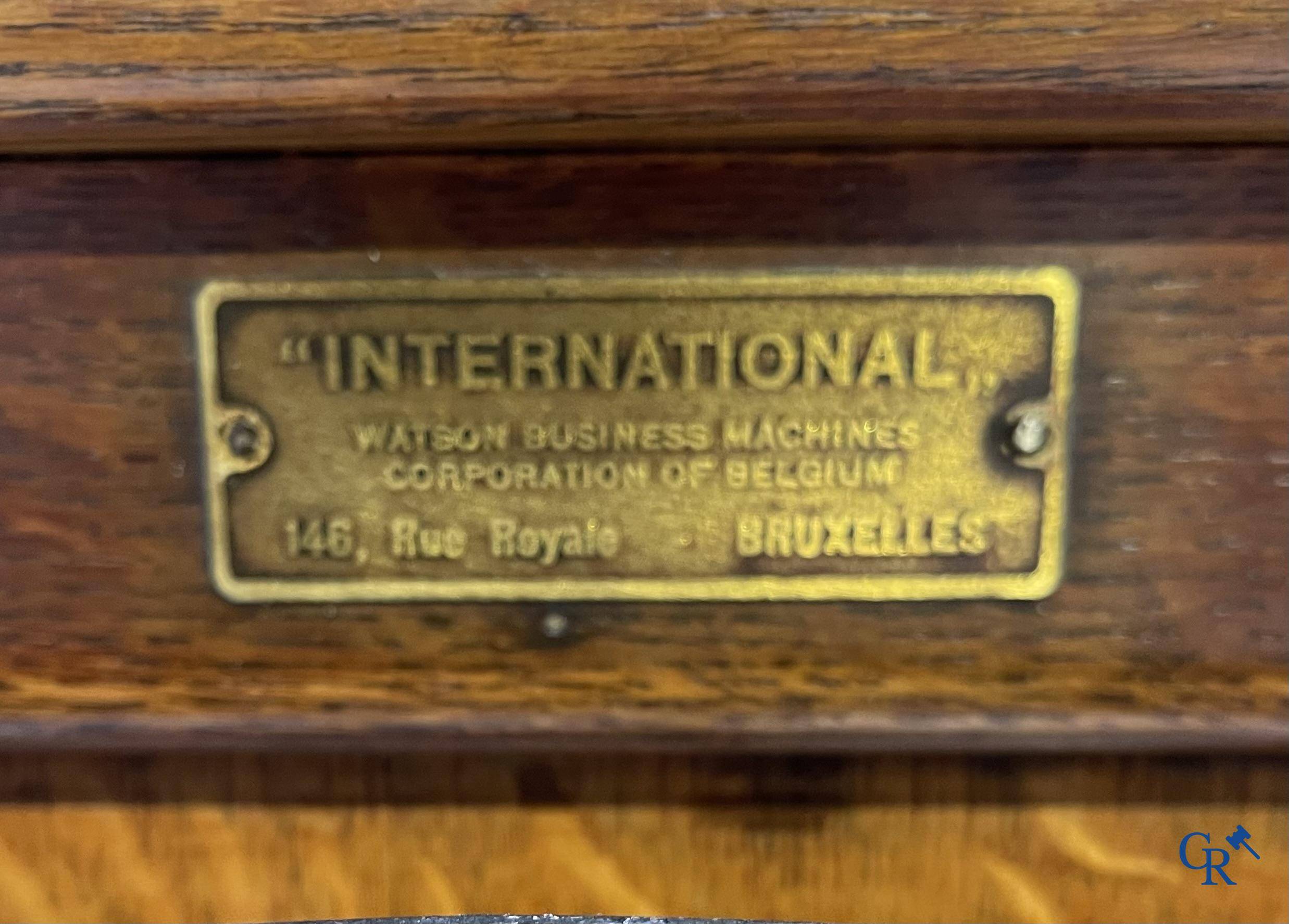 "International" Watson Business Machines Corporation of Belgium. A time clock with cast iron wheel. Circa 1900.