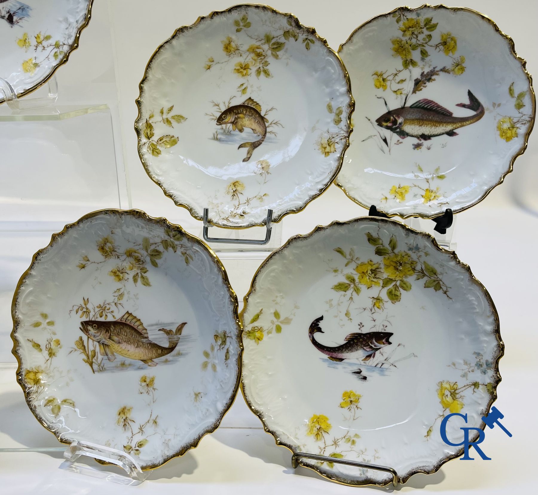 Extraordinary tableware in Brussels porcelain with a theme of freshwater fish.