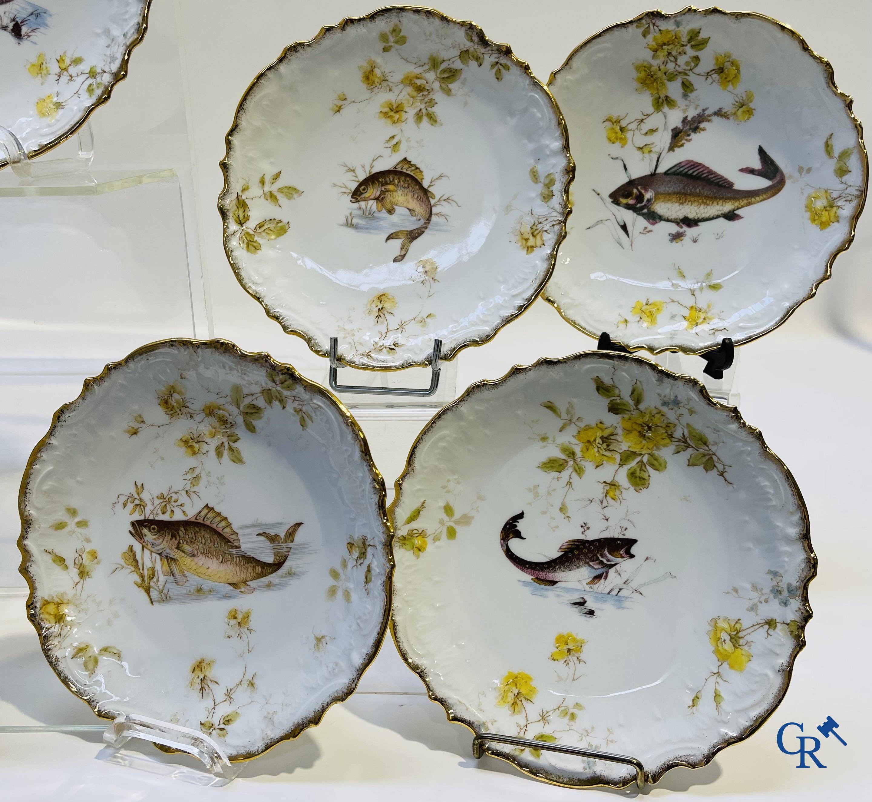 Extraordinary tableware in Brussels porcelain with a theme of freshwater fish.