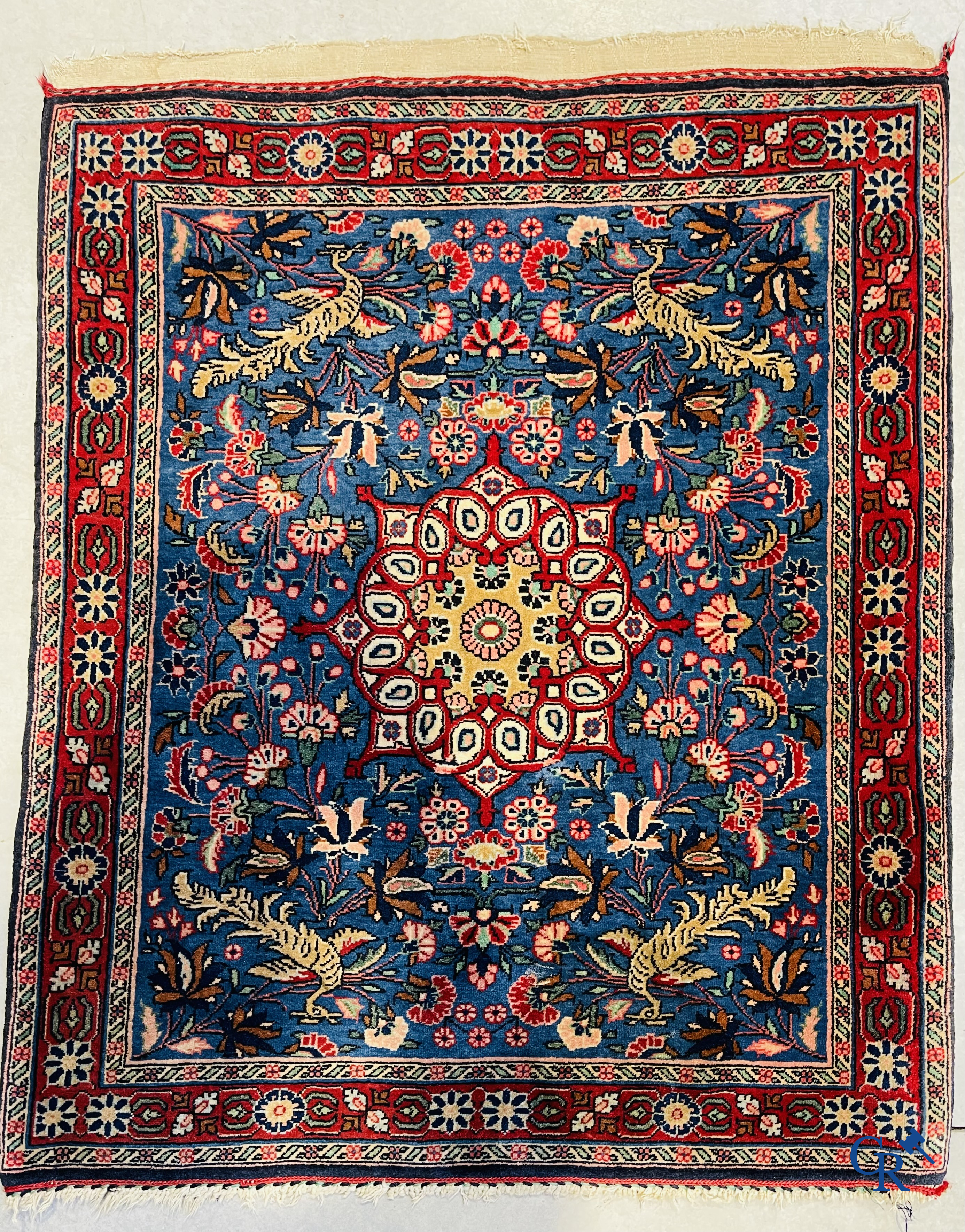 Persian carpets: A lot of 2 finely knotted Oriental carpets. Floral decor and floral decor with birds of paradise.