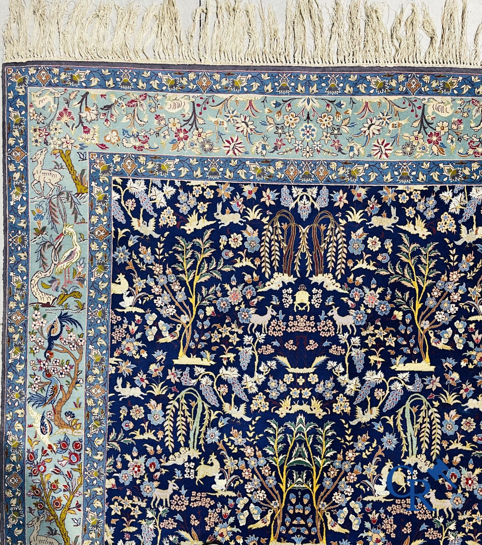 Oriental carpets: Iran. Isfahan, Persian hand-knotted carpet with a decor of animals, birds, plants and flowers.