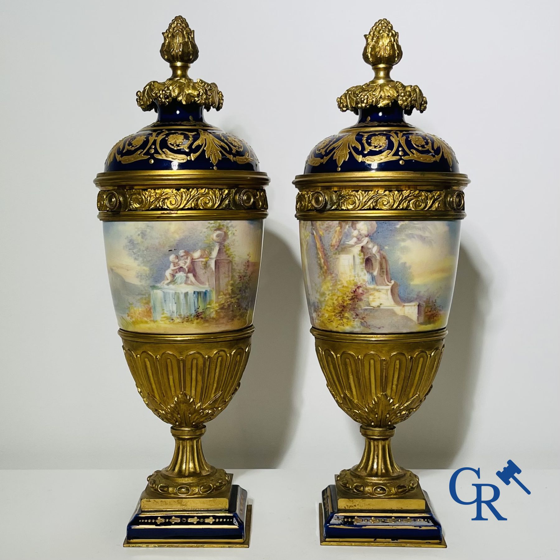 Porcelain: Sèvres: Pair of bronze mounted vases in Sèvres porcelain. Napoleon III period.