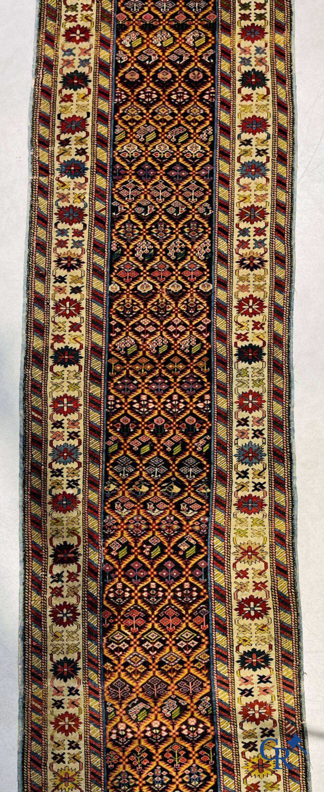 Tapis: Un ancien tapis oriental.