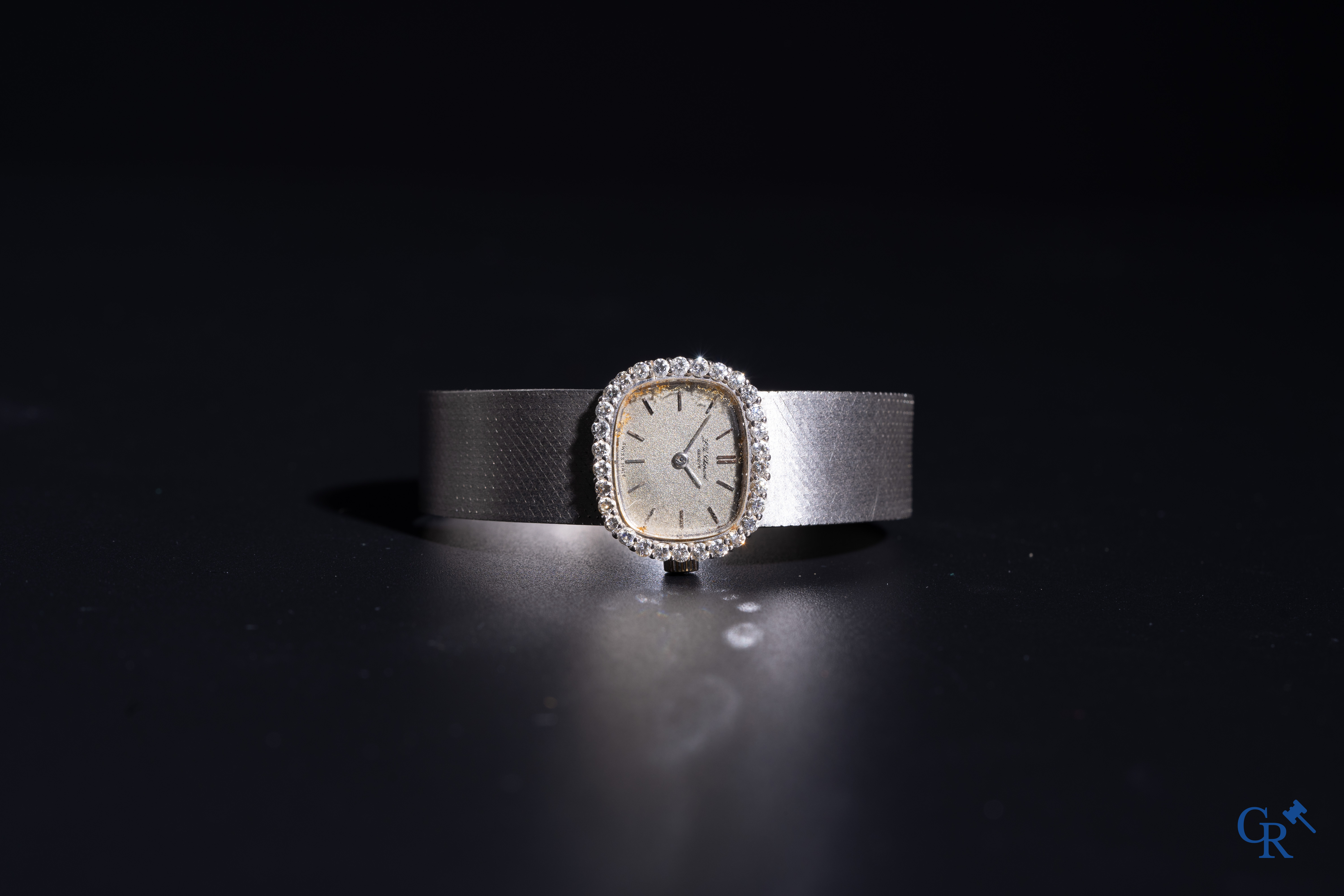 Bijoux: Chopard Genève, montre-bracelet femme en or blanc 18k (750°/00) sertie de 30 diamants.