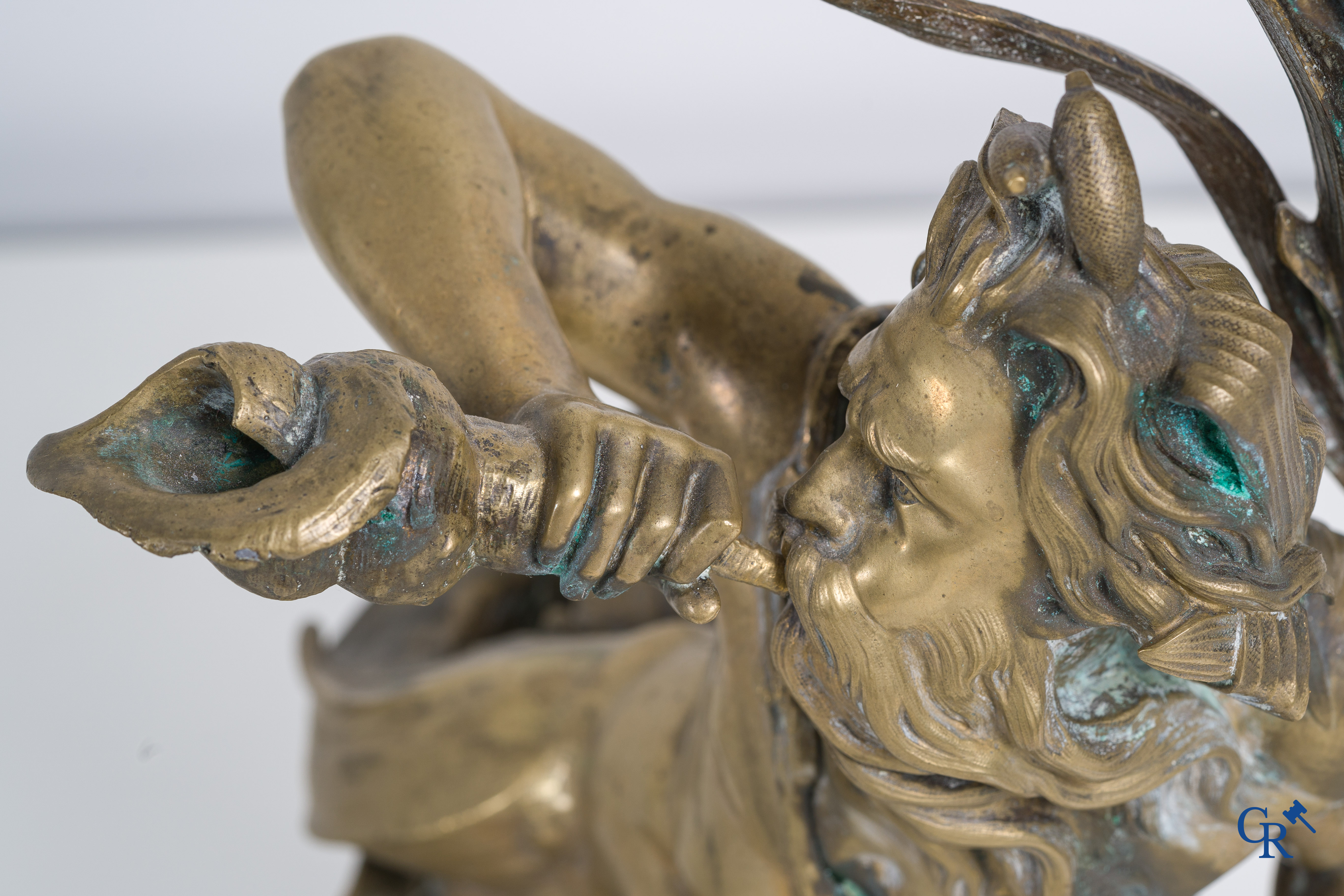 A large pair of finely chiseled bronze chenets with Tritons. Louis XV style. Napoleon III period.