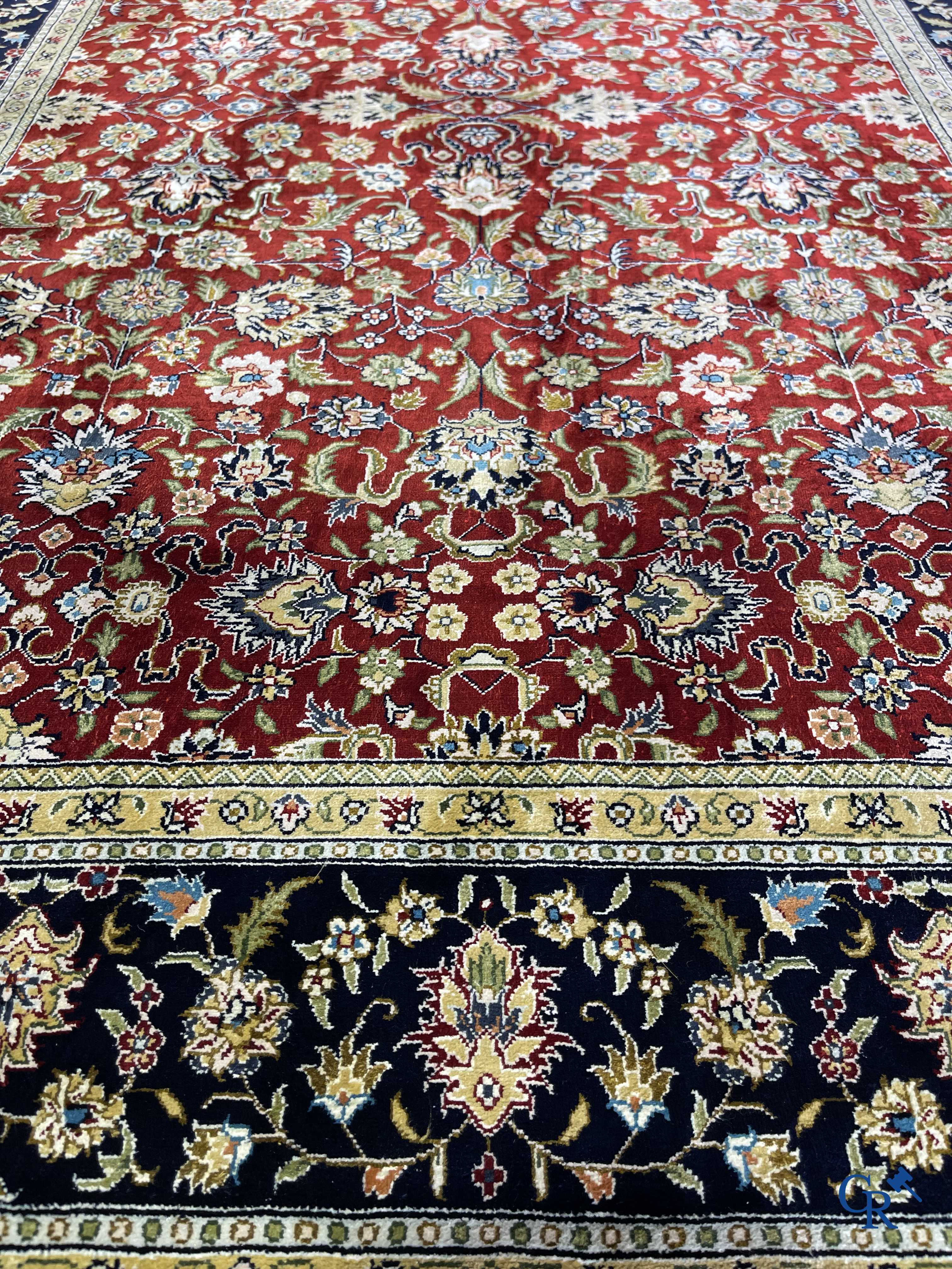 Oriental carpets: Iran, a hand-knotted silk Persian carpet with floral decor.