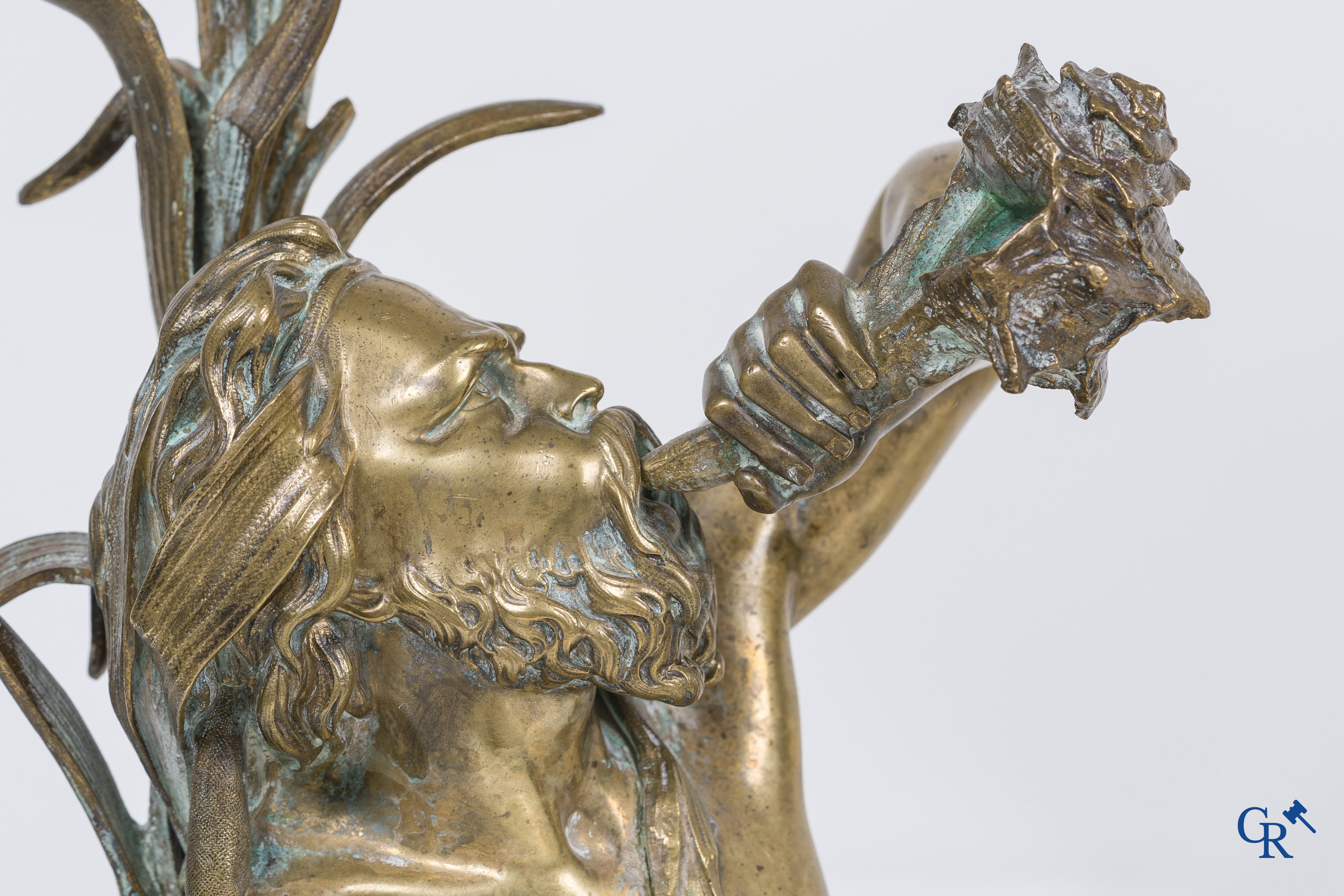 A large pair of finely chiseled bronze chenets with Tritons. Louis XV style. Napoleon III period.