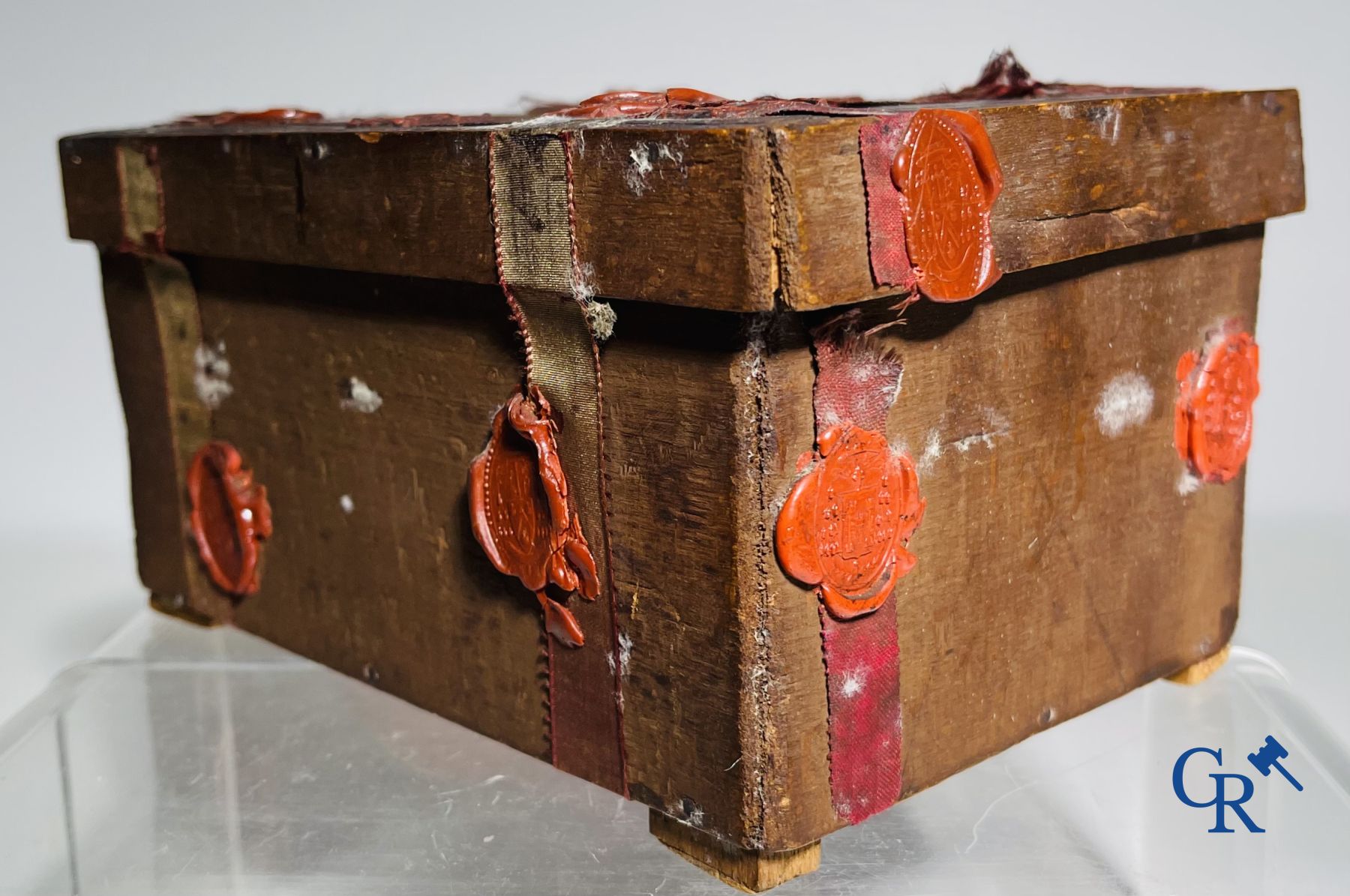 An antique wooden reliquary sealed with wax seals. Early 19th century.