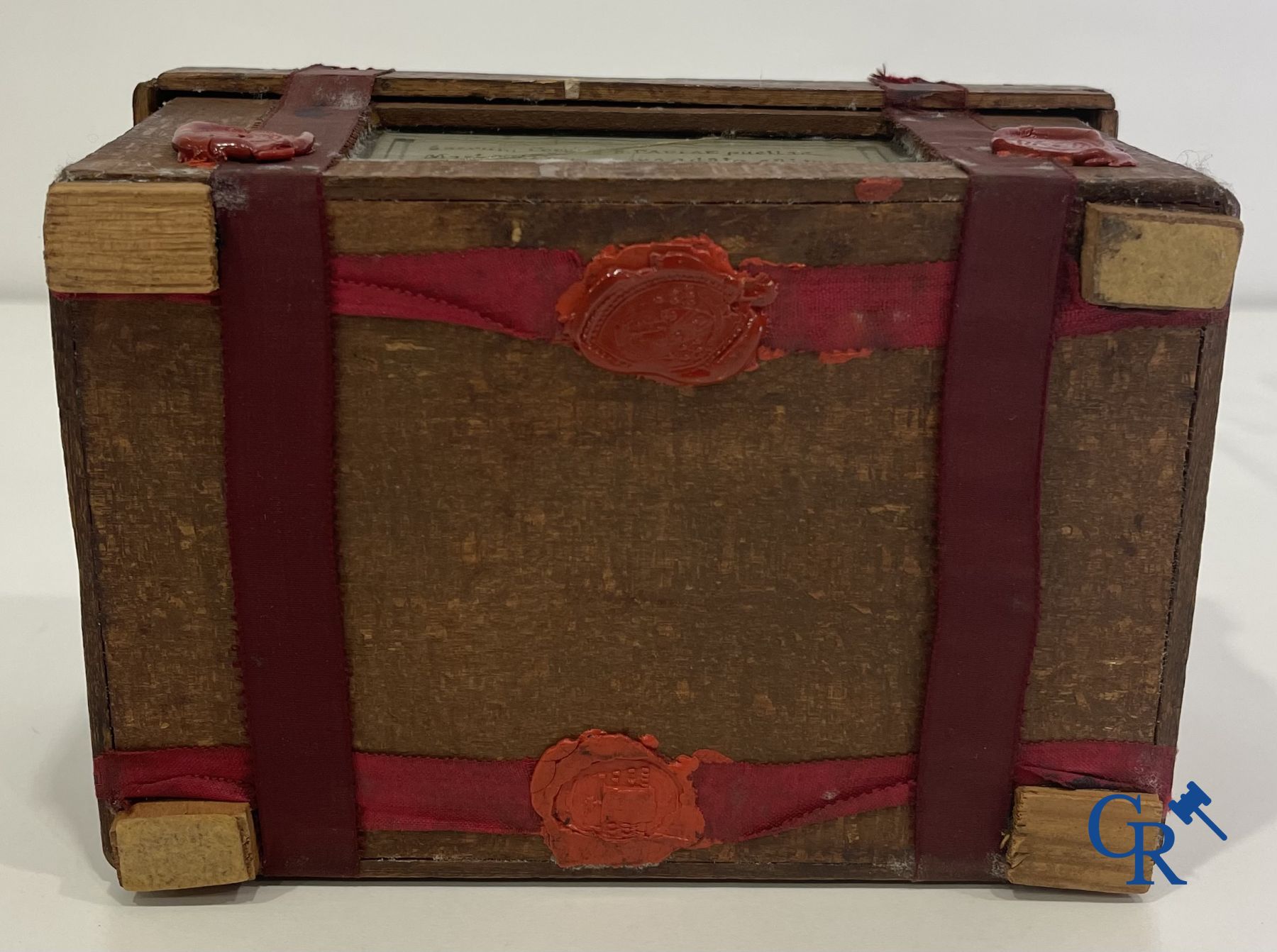 An antique wooden reliquary sealed with wax seals. Early 19th century.