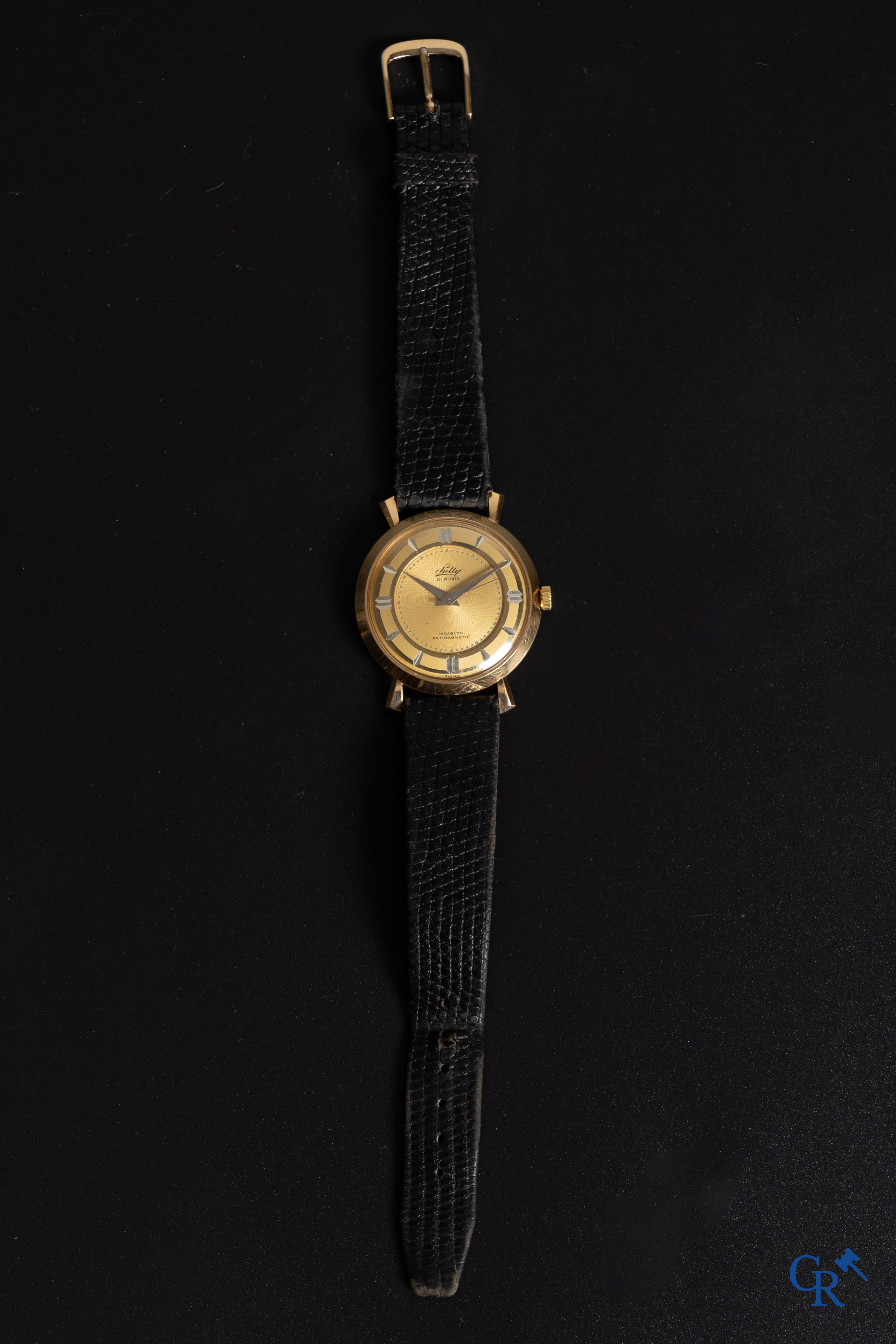 Watches: Sully, A men's wristwatch in gold 18K (750°/00).