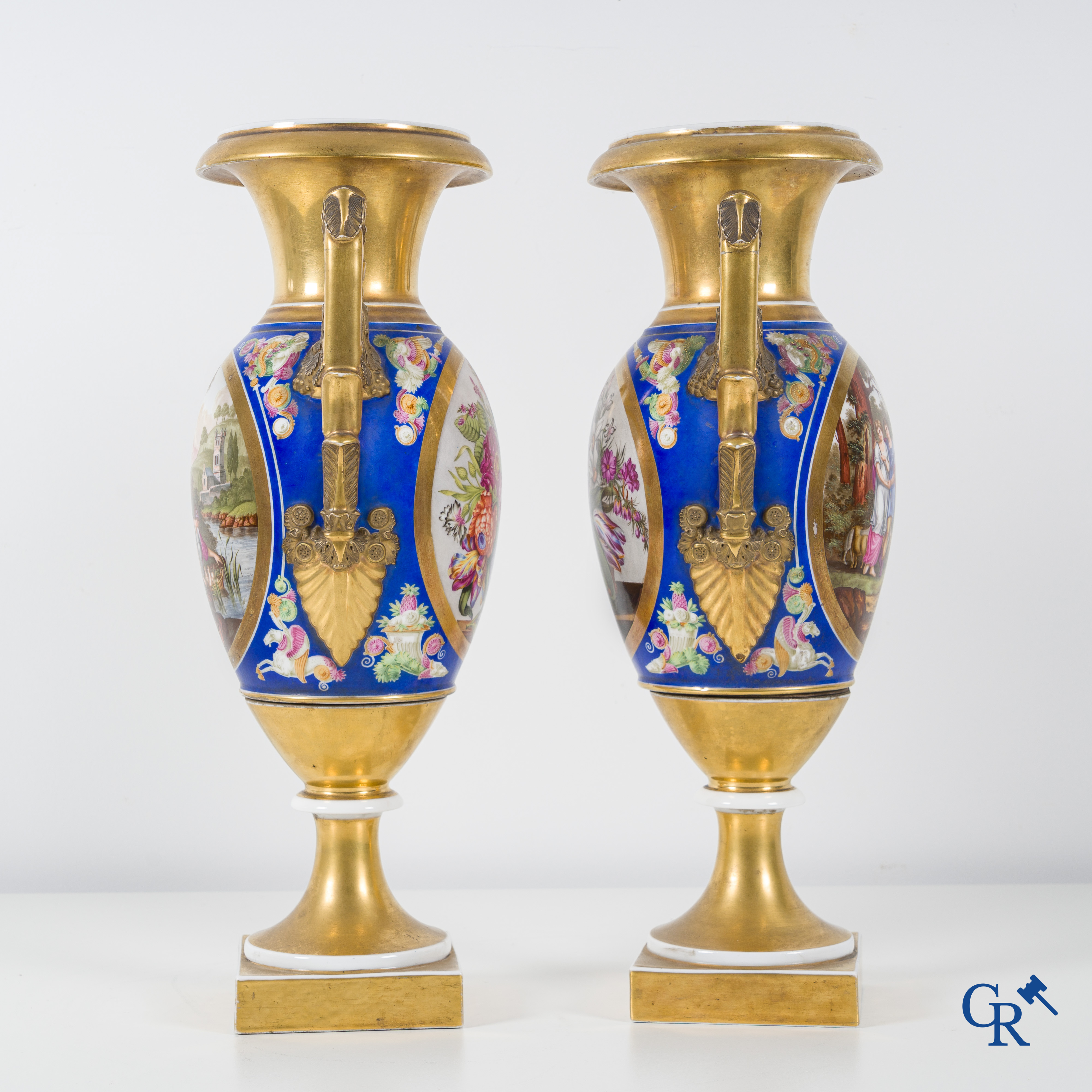 Empire, a pair of imposing multicolored decorated and gilded vases. Early 19th century.