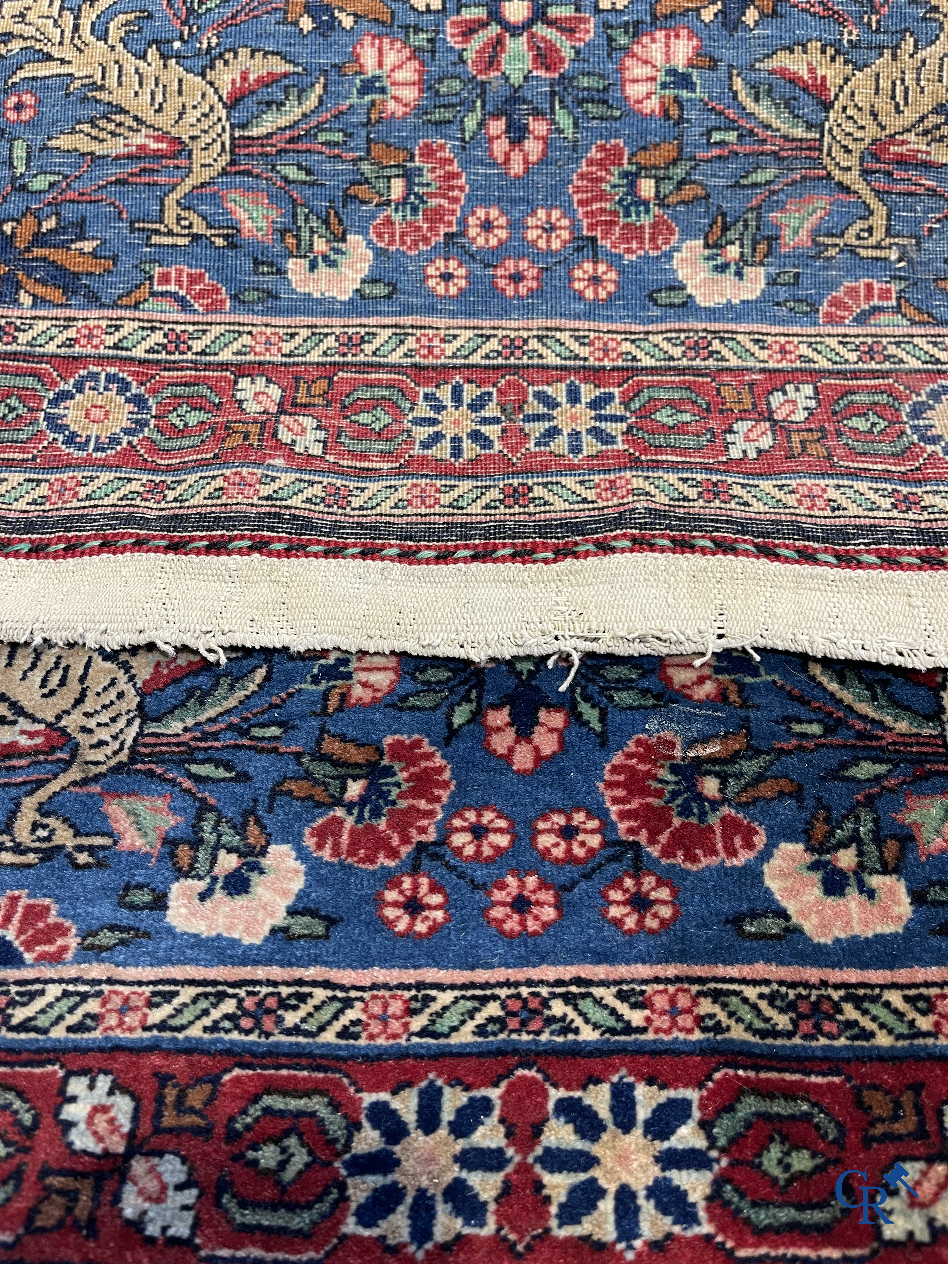 Persian carpets: A lot of 2 finely knotted Oriental carpets. Floral decor and floral decor with birds of paradise.