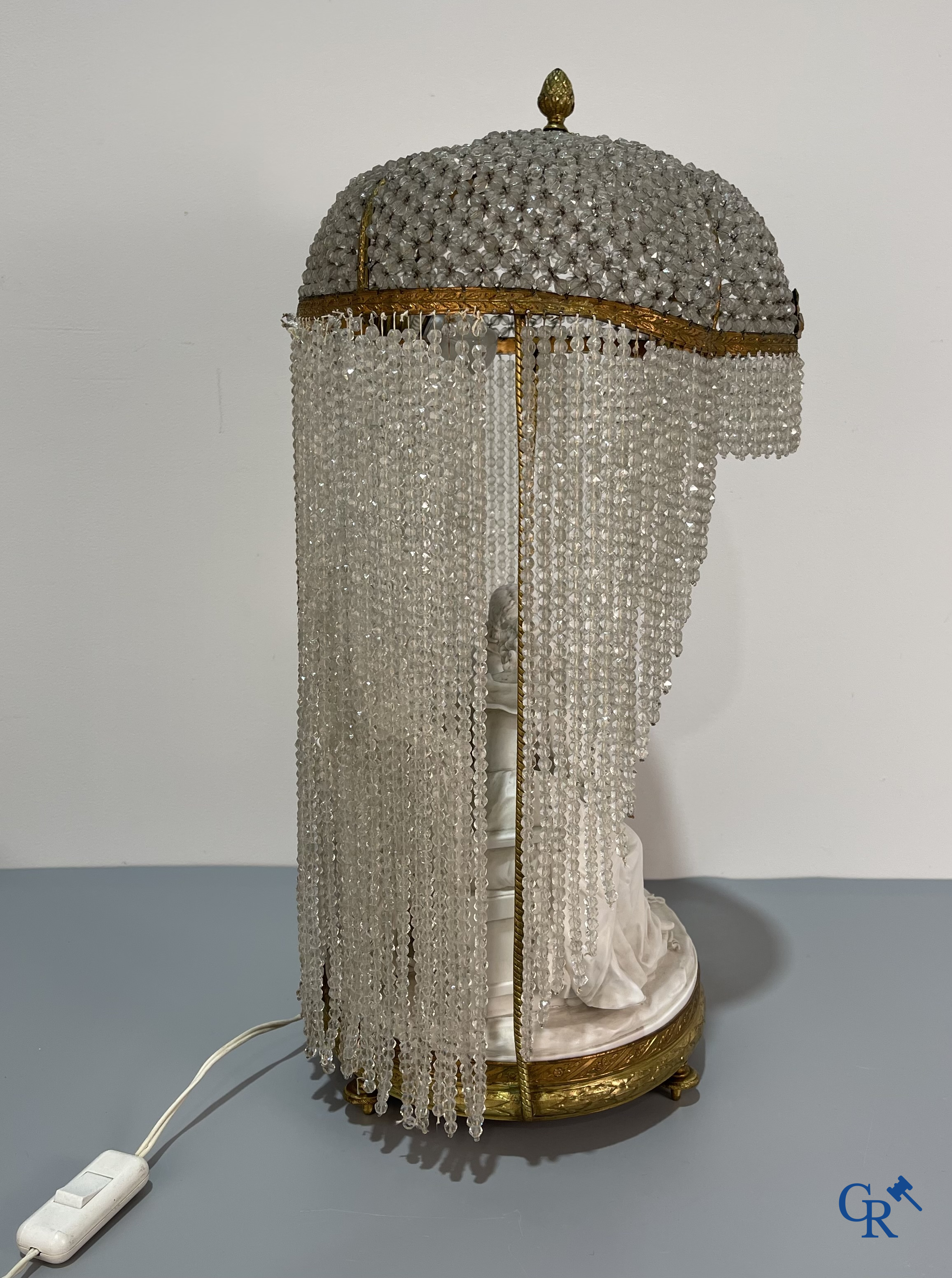 European porcelain, Karel Ens Volkstedt, a large lamp in biscuit and bronze, LXVI-style. Marked. Around 1920.