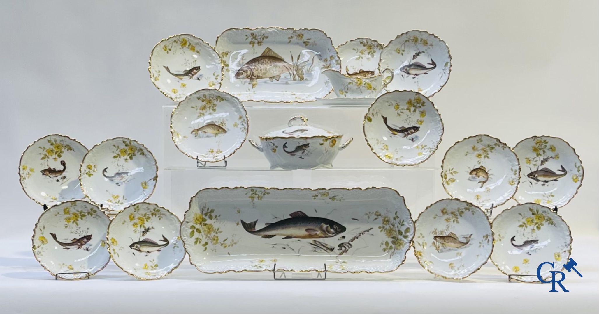 Extraordinary tableware in Brussels porcelain with a theme of freshwater fish.