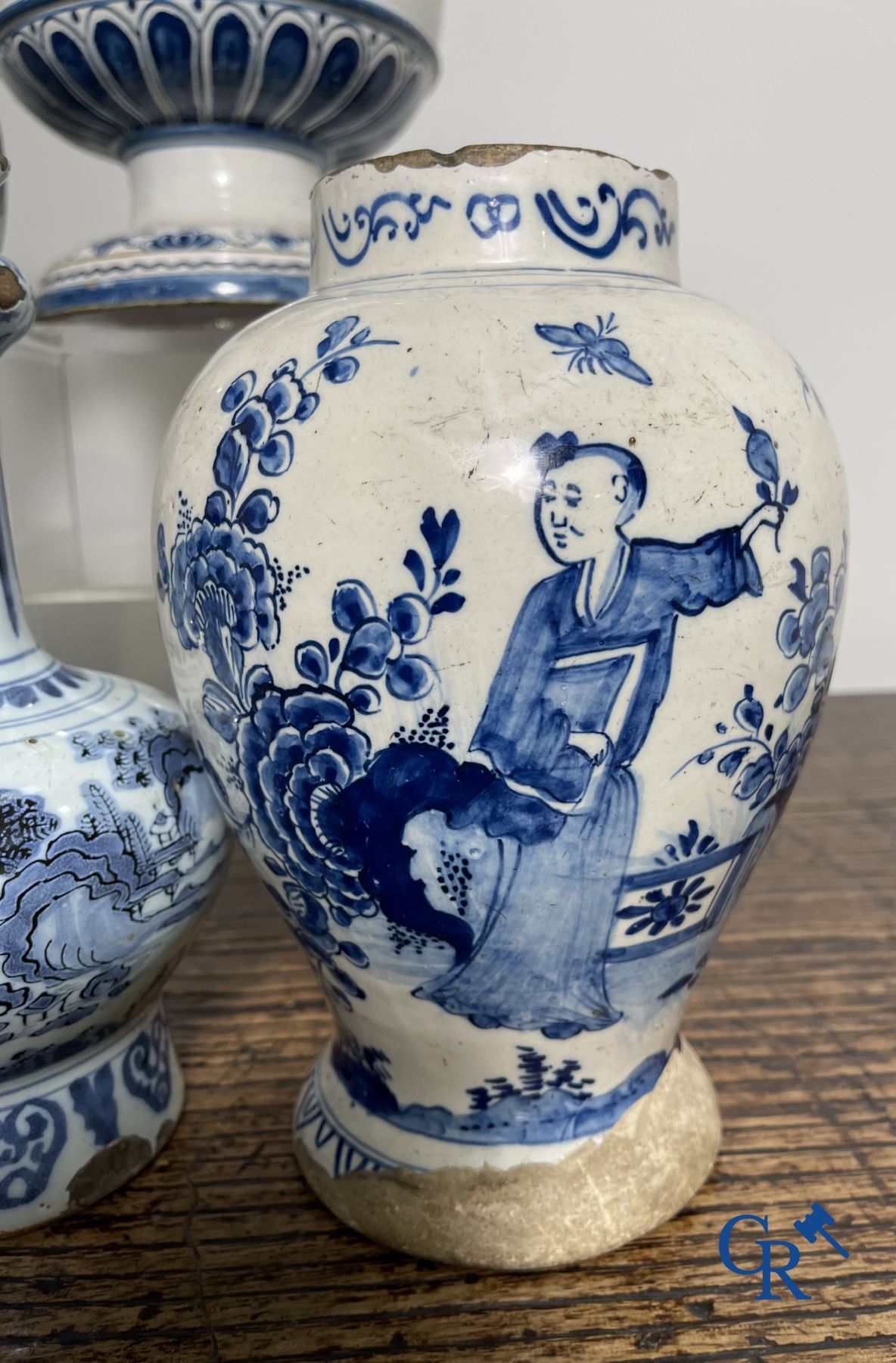 Delft: 11 pieces of blue and white faience with different décors. 17th - 18th century.