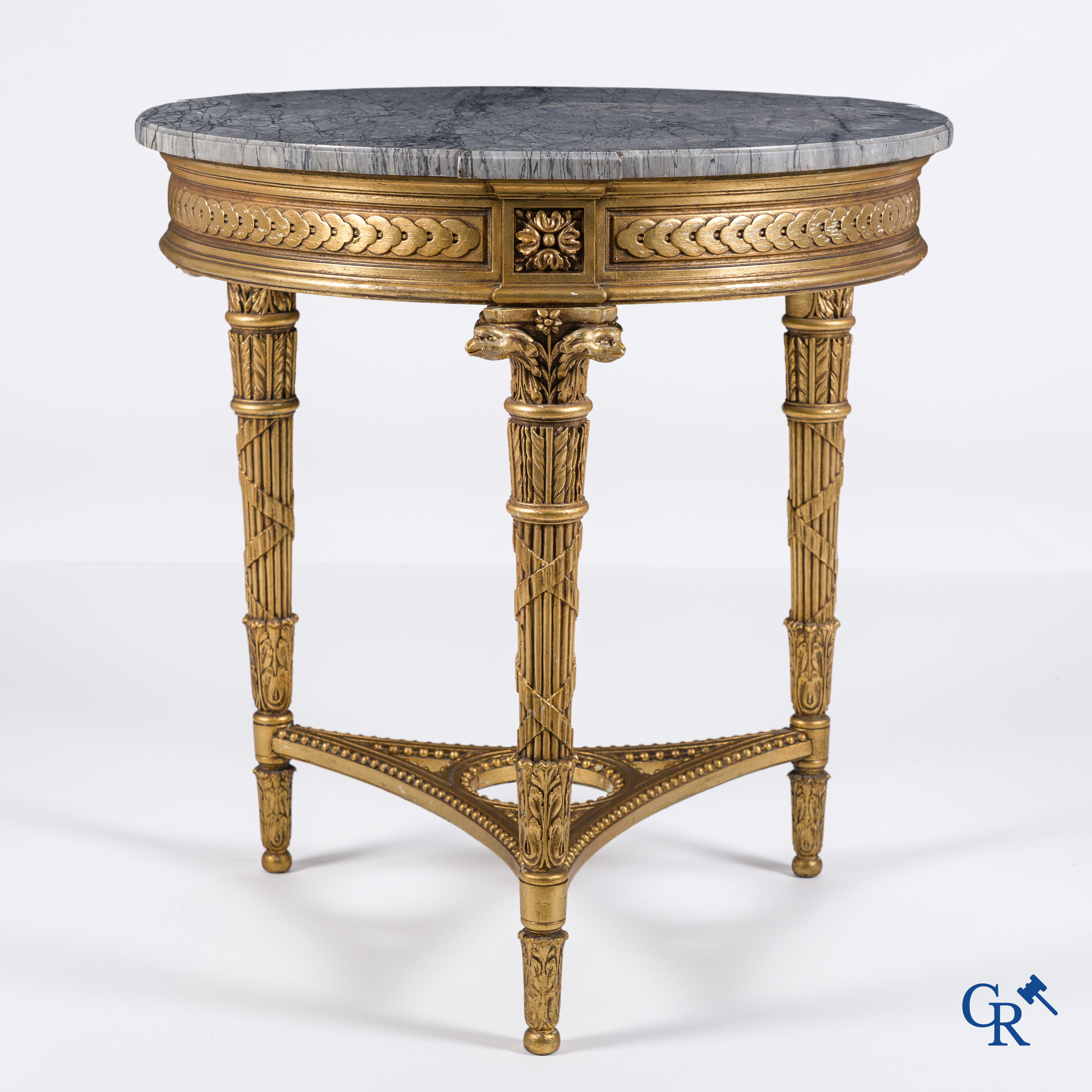 A wood-carved and gilded LXVI-style coffee table with a marble top in St. Anna marble.